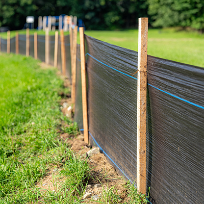 Silt Fence A wood-slat fence (also called snow fence) for beach erosion and dune preservation. Sand fence is an effective way to restore dunes, preserve coastline and property, and build sand drifts. It works by reducing local wind speed and trapping sand. View Products & Services